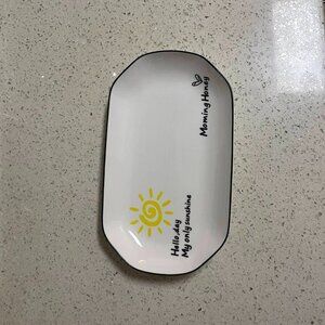 White rectangular plate with sunshine design